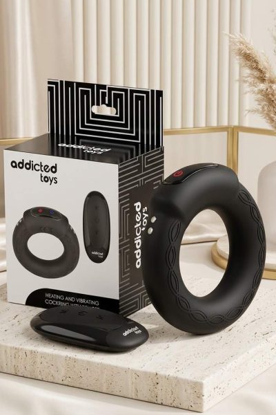 ADDICTED TOYS – WIBRACYJNY PIERŚCIEŃ NA PENISA Z EFEKTEM GRZANIA I PILOTEM